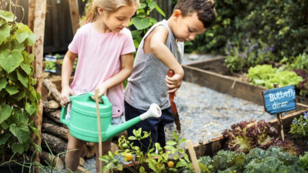 2 small children gardening